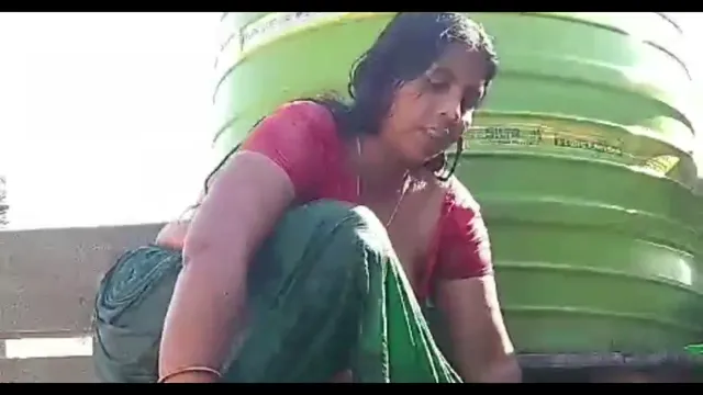 Village Wife Gets Naked for Outdoor Bath on Terrace in Leaked MMS